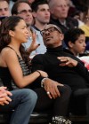Eddie Murphy and his new girlfriend (actress) Maya Gilbert // Los Angeles Lakers vs. Toronto Raptors basketball game in LA – March 9th 2010