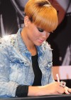 Rihanna signing autographs at MediaMarkit home electronics store in Berlin, Germany