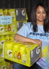 Raven Symone helping Pepsi drop off food at Second Harvest Bank in New Orleans
