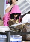 Nicki Minaj spotted at LAX airport in Los Angeles with her “rumored boyfriend” – May 27th 2010
