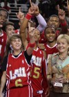 Justin Bieber, Romeo Miller, Trey Songz and other Team West players celebrate their win