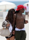 Lil Wayne and his new “mystery” girl at the beach in Miami