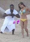 50 Cent on the beach in Mexico with a mystery lady