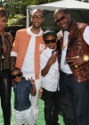 Swizz Beatz with his sons and Busta Rhymes & Eve