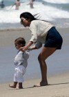 Kourtney Kardashian, Scott Disick and their son Mason at Manhattan Beach in California