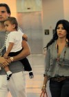 Kourtney Kardashian, Scott Disick and their son Mason at JFK Airport in NYC