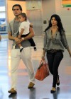 Kourtney Kardashian, Scott Disick and their son Mason at JFK Airport in NYC