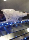 Miguel planking (going down an escalator)