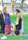 Russell Simmons & Heidi Klum doing yoga at Riverbank State Park in New York City