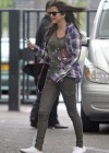 Selena Gomez wearing her boyfriend Justin Bieber’s purple plaid shirt