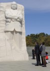 The Obama family and Dr. Martin Luther King’s family look at the new MLK Memorial