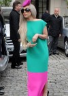Lady Gaga wearing a bright pink “sperm hat” in London, England