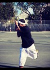 Drake playing tennis with friends