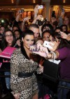 Kim Kardashian posing with fans