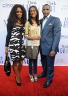 Tasha Smith with her husband Keith and their daughter