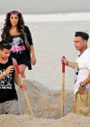 Snooki with Vinny and Pauly D at the Jersey Shore bonfire