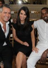 Kim Kardashian and Kanye West with Valentino CEO Stefano Sassi at the Valentino fashion show — Paris Fashion Week 2012
