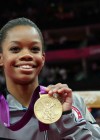 Gabby Douglas with her gold medal — 2012 London Olympics
