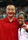 Gabby Douglas and coach Liang Chow celebrate her second gold medal win — 2012 London Olympics