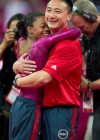 Gabby Douglas and coach Liang Chow celebrate her second gold medal win — 2012 London Olympics