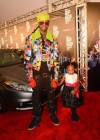 2 Chainz and his daughter on the red carpet at the 2012 BET Hip-Hop Awards in Atlanta