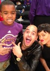 Chris Brown & Rihanna (with rapper Game’s son Harlem) at Knicks/Lakers basketball game in Los Angeles – Christmas 2012