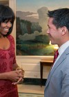 First Lady Michelle Obama shows off her new bangs