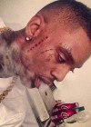 Soulja Boy showing off his new “Rich Gang” tattoo in Miami