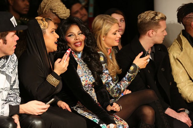 Pregnant Lil Kim Debuts Baby Bump at New York Fashion Week: 