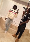 Chief Keef & Ballout posing with guns on Instagram