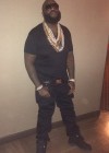 Rick Ross showing off his dramatic 100 pound weight loss