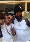 Rick Ross showing off his dramatic 100 pound weight loss