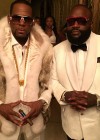 Rick Ross (with R Kelly) showing off his dramatic 100 pound weight loss