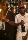 Rick Ross (with Young Jeezy) showing off his dramatic 100 pound weight loss