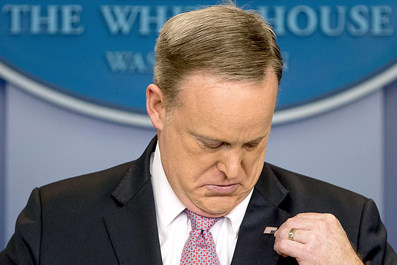 Twitter Reacts to Sean Spicer Wearing Upside Down American Flag Pin