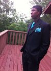 Bakari Henderson in what looks like a prom suit