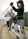Nasim Aghdam pictured at a PETA protest in 2009