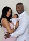 Ray J and wife Princess Love pose with their one-week old baby girl Melody